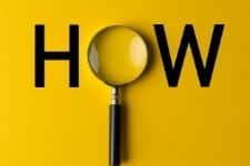 mot how avec une loupe à la place du O